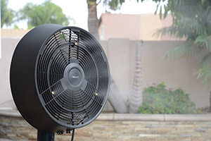 Outdoor fan with water mister
